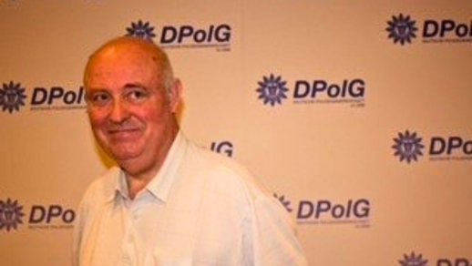 Porträt von Harry Groenig, einem älteren Mann mit freundlichem, ruhigem Ausdruck; er wirkt würdevoll und zugewandt – ein prägender Gewerkschafter der Aufbaujahre der DPolG Berlin.